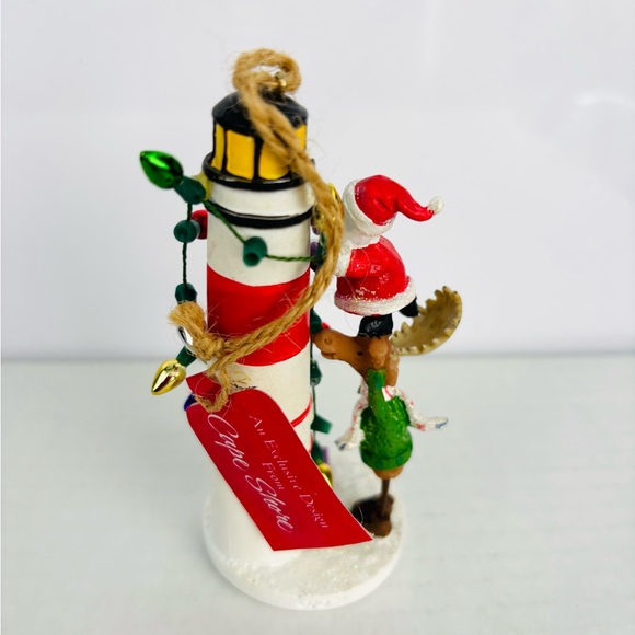 Santa & Moose Decorating a Lighthouse Christmas Ornament Julia Oliver Cape Shore - Picture 2 of 6